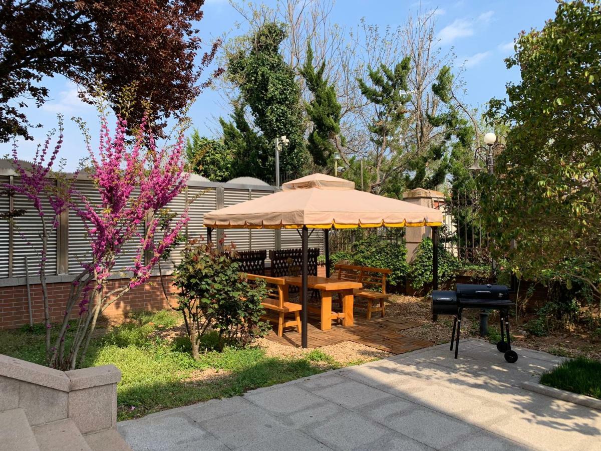 Floral Hotel - Begonia Villa تشينغداو المظهر الخارجي الصورة